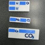 Three compounds are shown with pieces joined together; LIsub(2)O, NaCl and CaCOsub(3)